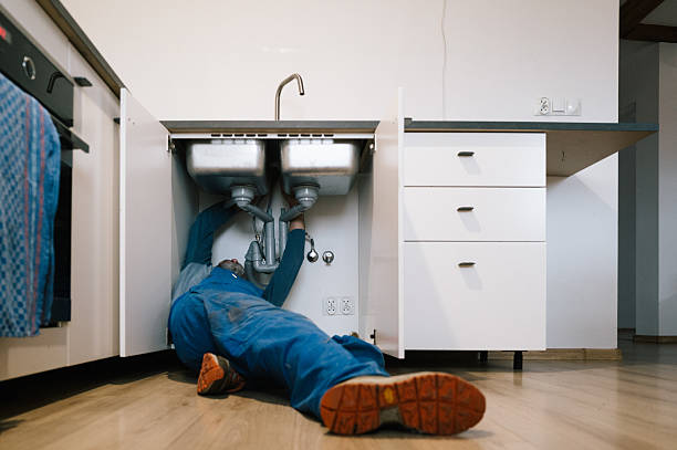 Professional Drain Cleaning technician working in Chapin, IL